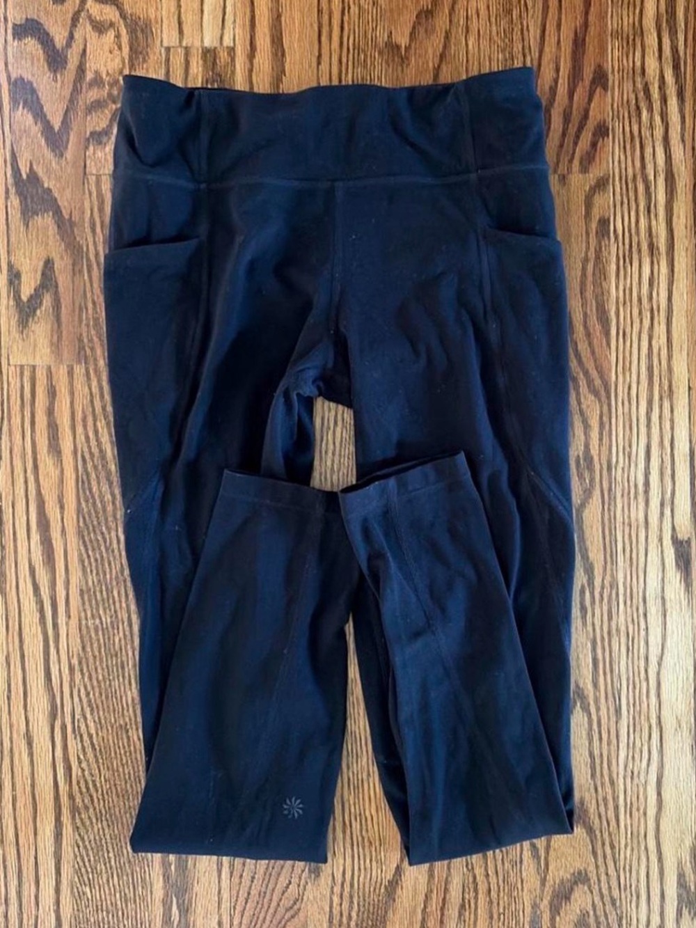 Black Athleta girl leggings with pull string waist and side pockets. Size xxl 16
